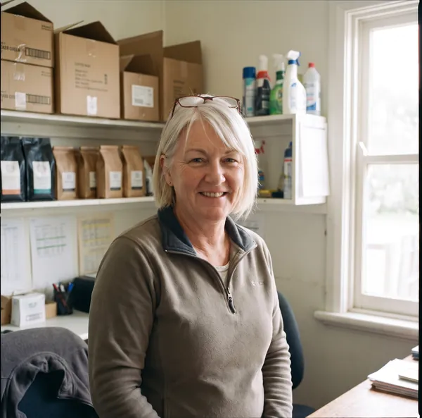 Kylie Brandt, smiling, in her office.