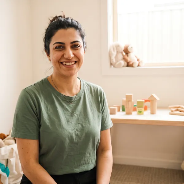 Leila Moradi smiling, in the clinic’s play room.